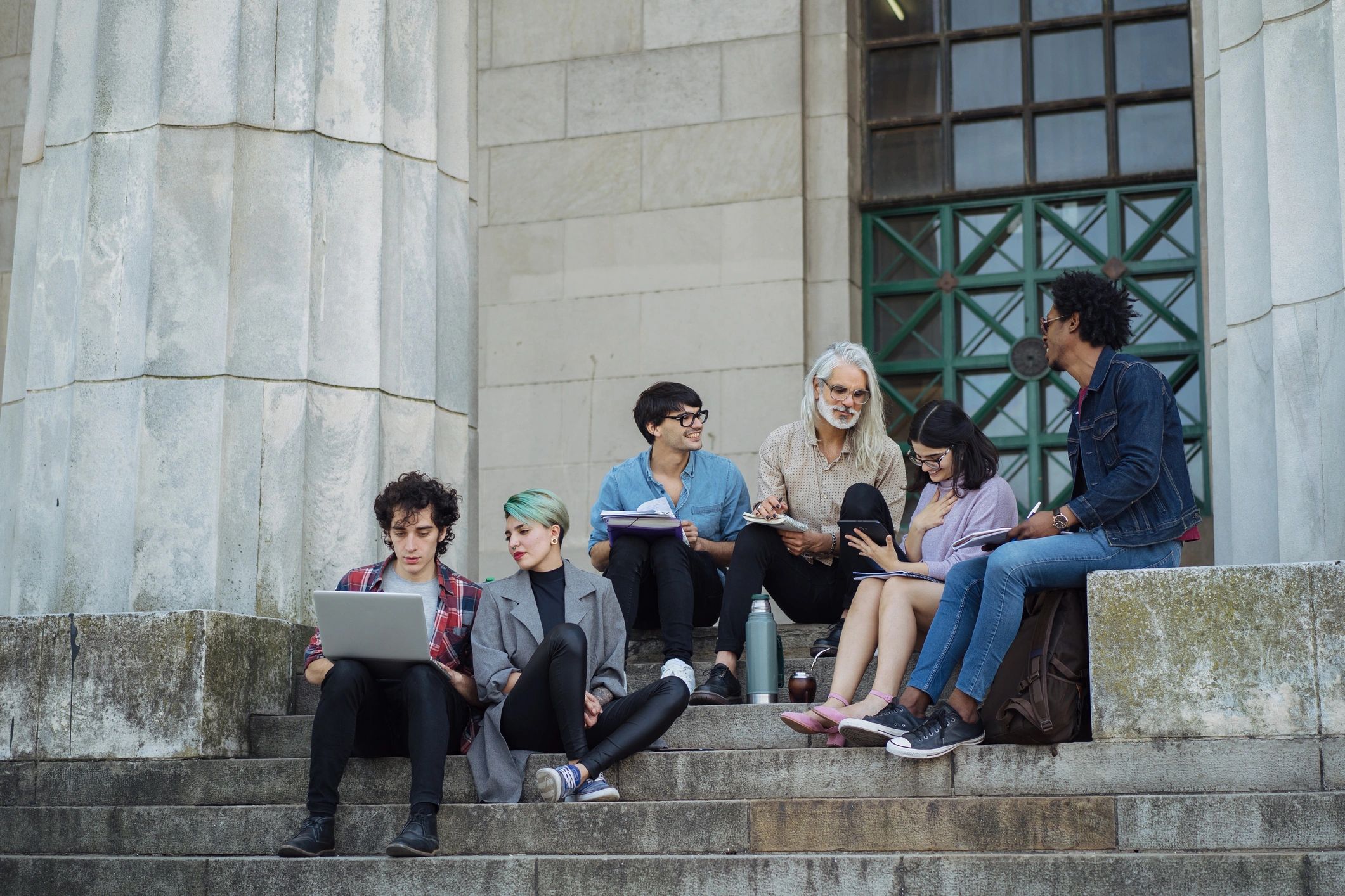 Students learning together outdoors